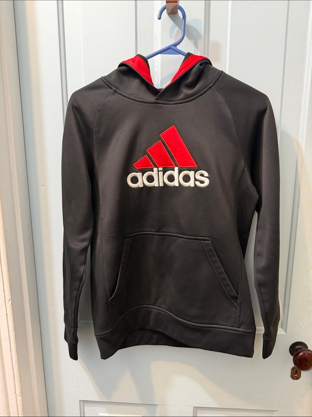 Adidasa Black Climawarm Pullover with Red Logo Size L(14-16)
